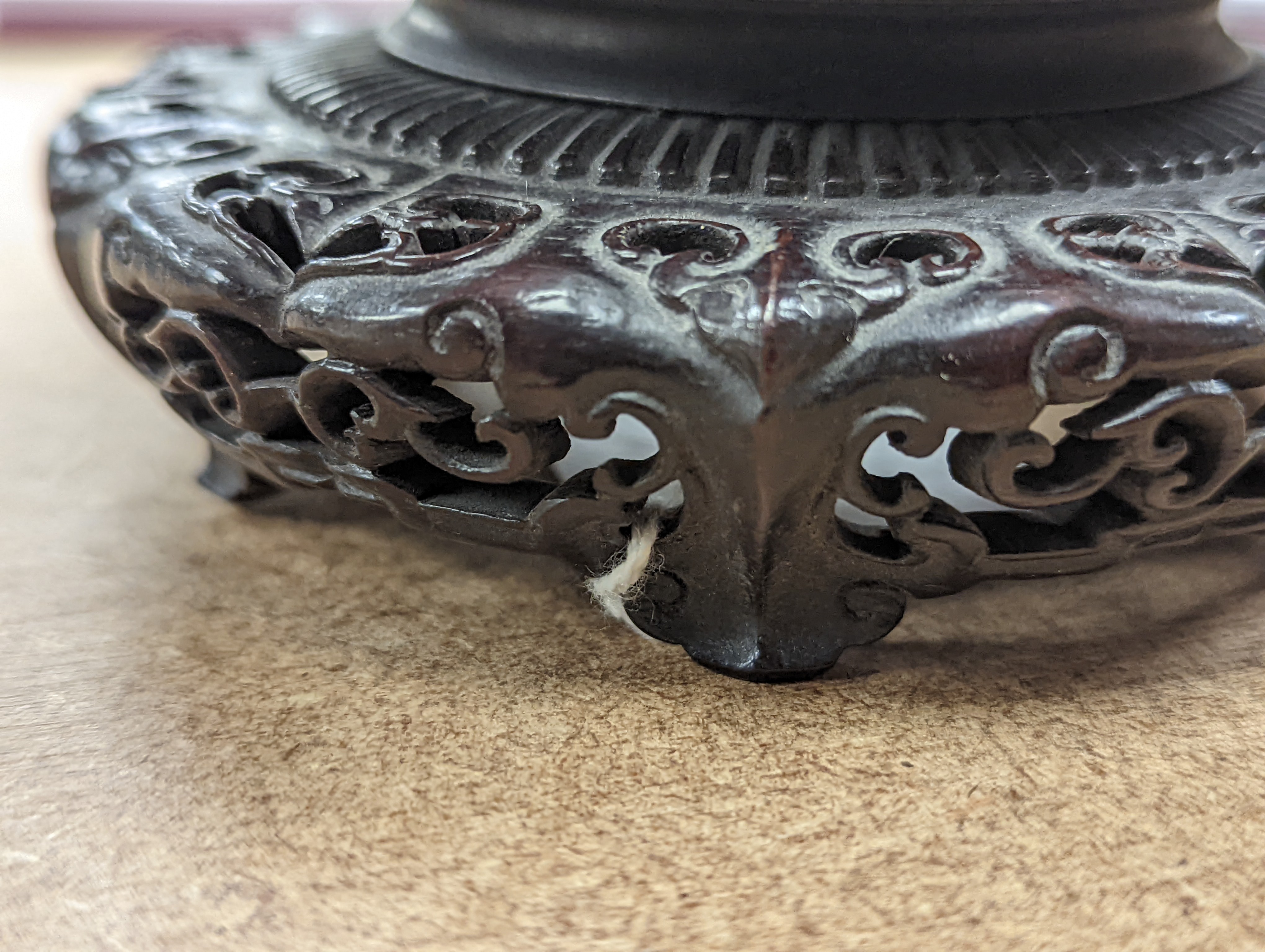 A fine 19th century Chinese hardwood stand, 11.4cm diameter